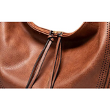 Tímea™ - Áttört bőr táska bőr rojttal