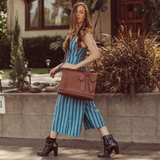 Valéria™ - Virágos áttört bőr táska masnival