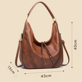 Tímea™ - Áttört bőr táska bőr rojttal